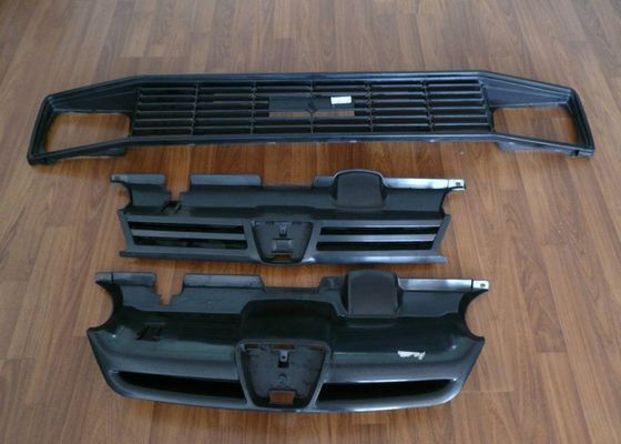 Stampa professionale Stampaggio a iniezione Parti di plastica per lampadina a griglia auto Bump Centro di controllo remoto Stampaggio porta auto